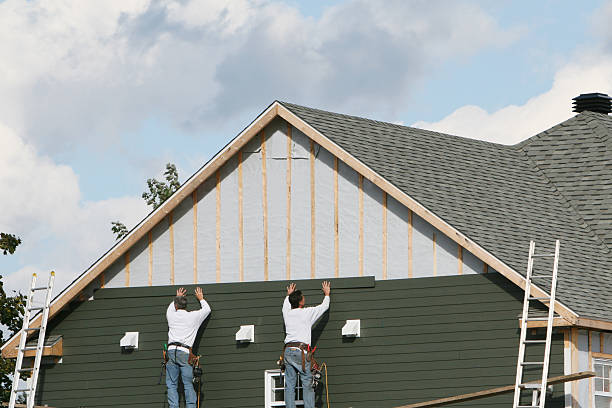 Professional Siding technician working in Johnstown, CO